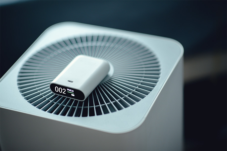 Air purifier with digital air quality monitor.
